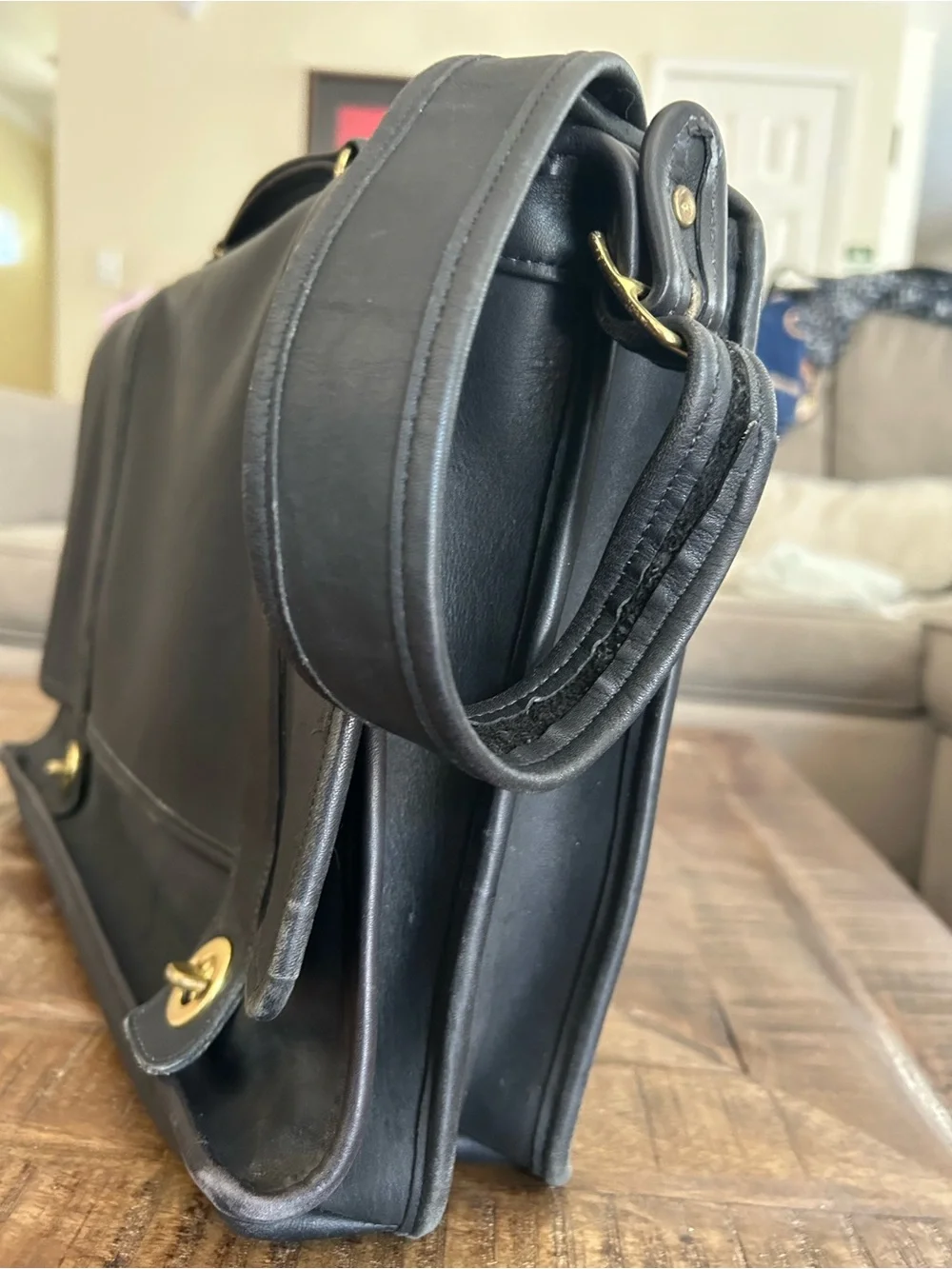 Coach Black Leather Messenger Bag with Gold Hardware